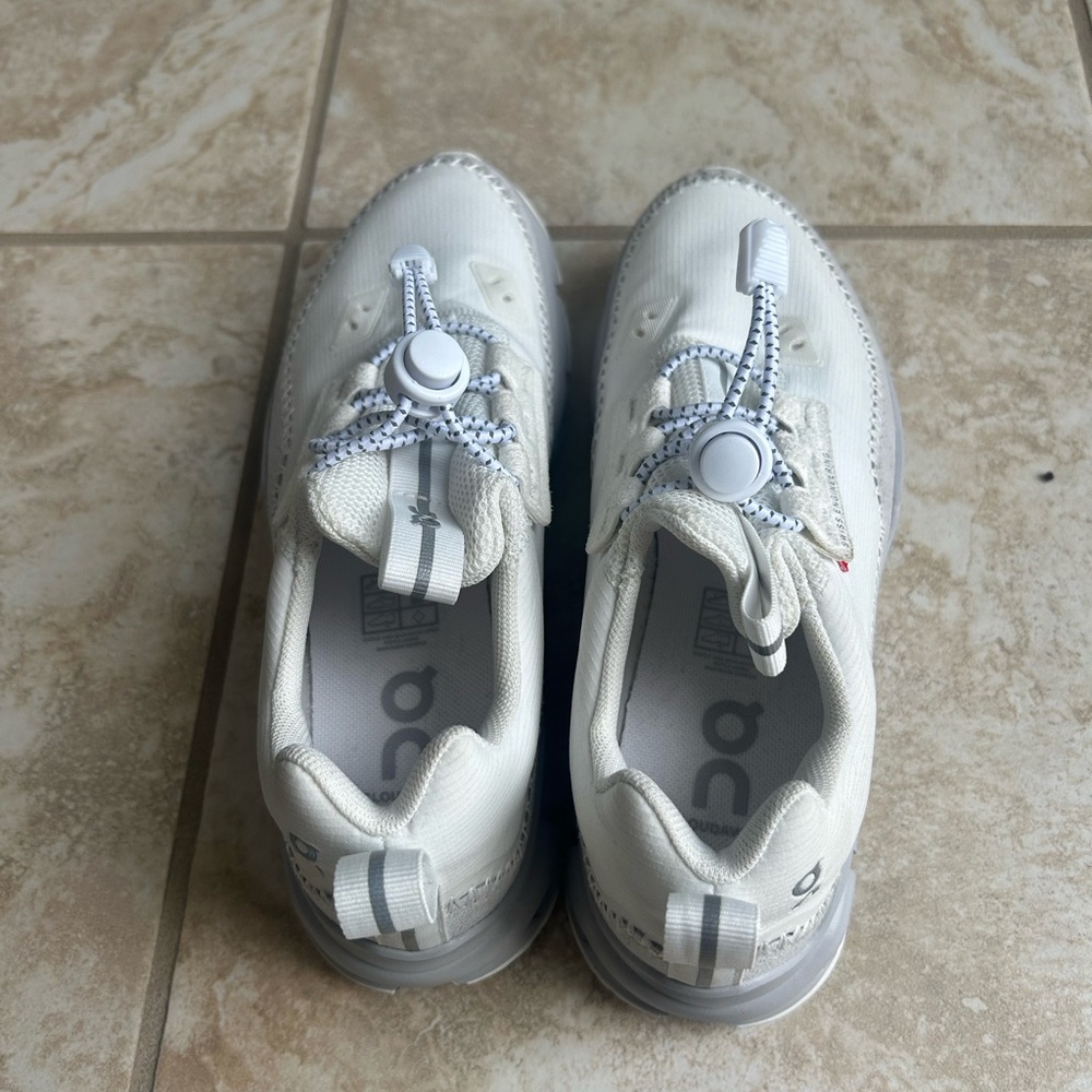 On Running White and Gray Sneakers